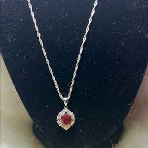 Silver Tone Necklace with Red Gemstone Pendant